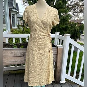 Yellow floral wrap dress